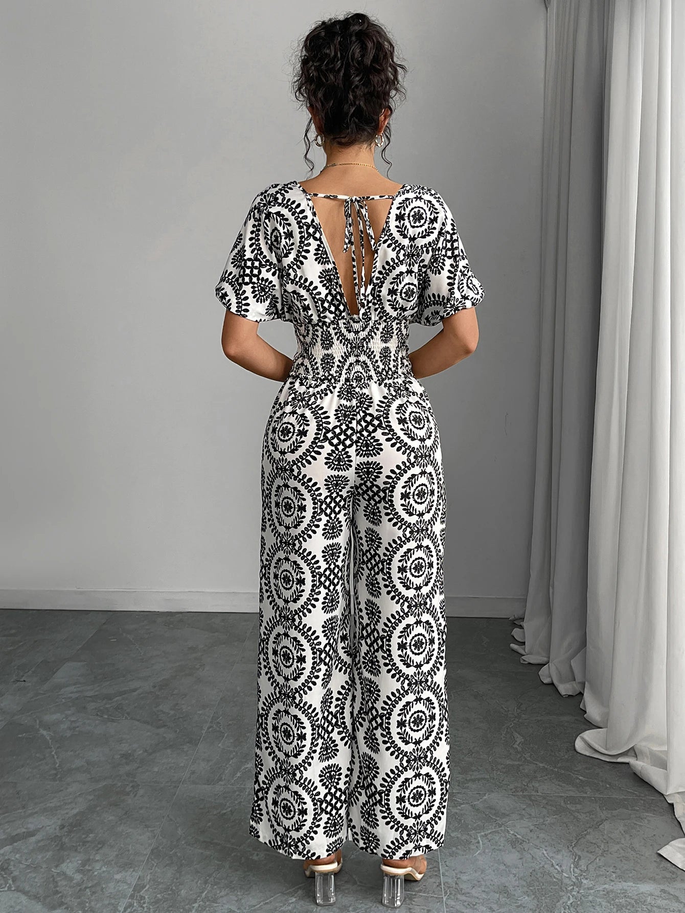 Bohemian jumpsuit short sleeves, Plunging V Neck Back with tie, Long wide legs