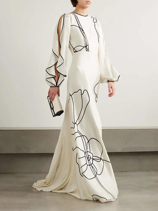 Boho Floor Length Evening Dress, Round Neck, Open Ruffled Sleeves trimmed in Black, Dress has an artistic Black on White Floral Design
