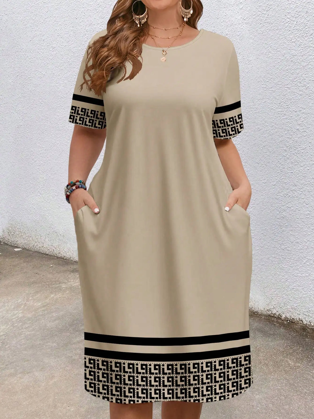 Sizes to 5XL, short-sleeved, round-neck, geometric ethnic borders, loose fit with pockets