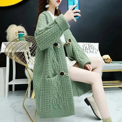 Cable Knitted Mid-Length Cardigan with Pockets and Two Large Black Buttons. Peach, Yellow, Off White, and Green