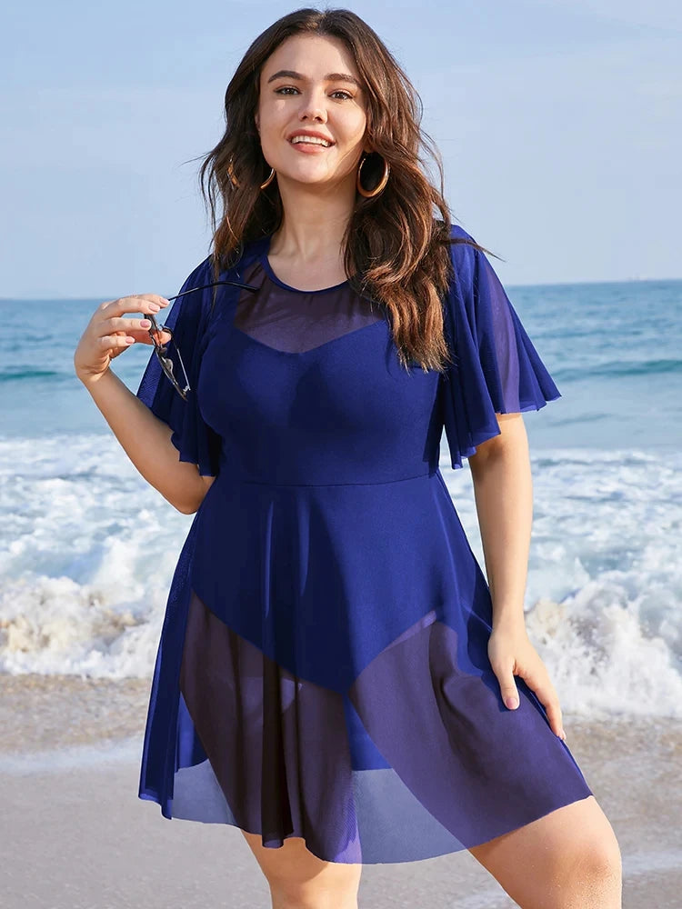 Sizes to 6 XL. One Piece Tummy Control Swimdress Solid Mesh, Ruffle Sleeved Cover Up in Blue, Black, and Burgundy